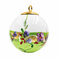 Boule de Noël fleurs en porcelaine 5,5 cm, référence 26, fleurs violettes et mauves, dessous vert, vue 2.