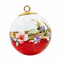 Boule de Noël fleurs en porcelaine 5,5 cm, référence 28, fleurs roses et mauves, dessous rouge orangé, vue 2.