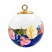 Boule de Noël fleurs en porcelaine 5,5 cm, référence 34, fleurs roses et jaunes, dessous bleu profond, vue 1.