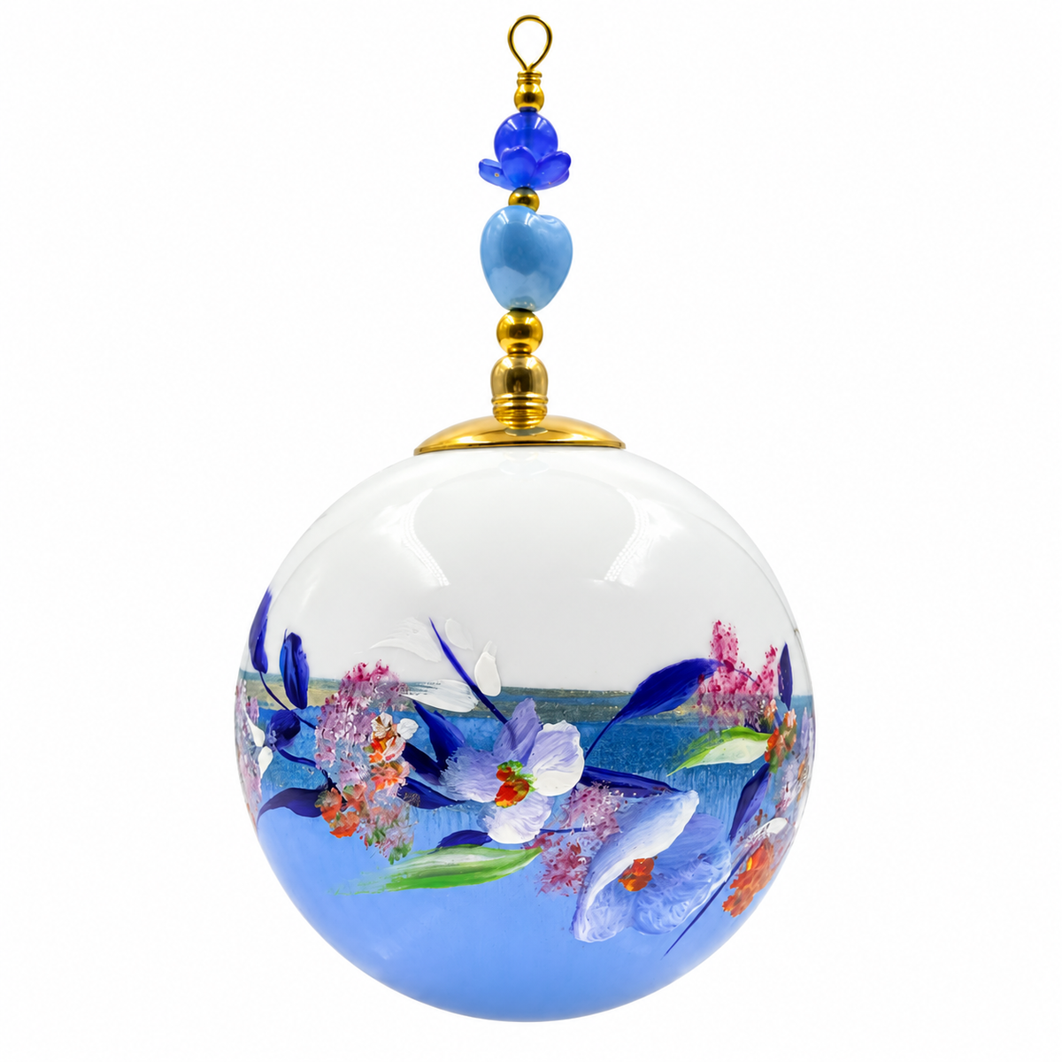 Boule de Noël artisanale personnalisable 6,5 cm, référence 21, vue 3 — Fleurs bleues et roses sur bleu lavande